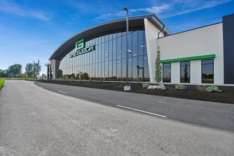 Greyloch Headquarters Exterior greyloch facility entrance with glass curtain wall facade