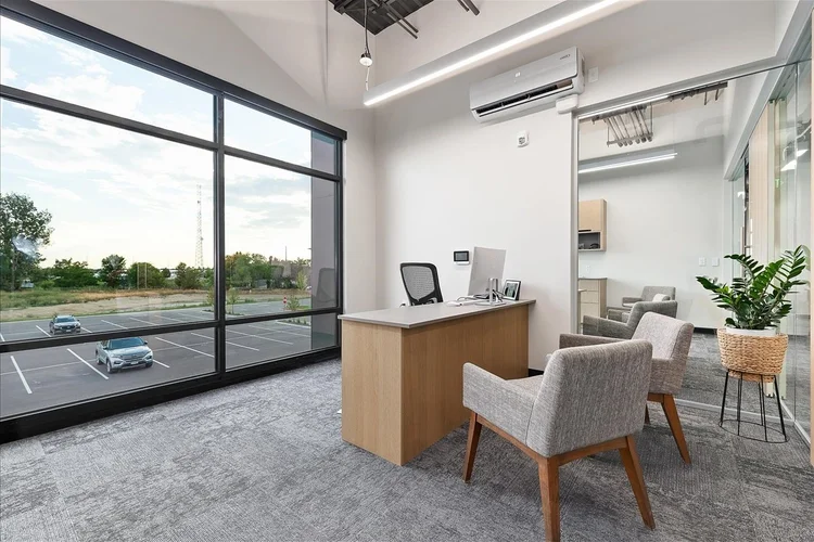 Greyloch Commercial Office Space bright commercial office interior with large windows