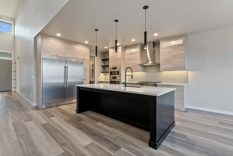 Greyloch Kitchen with Black Island and Stainless Appliances modern kitchen with black island and stainless steel appliances
