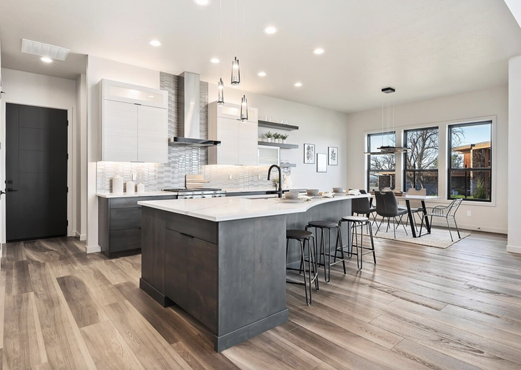 Greyloch Dark Gray Kitchen Island dark gray kitchen island with bar stools and large windows