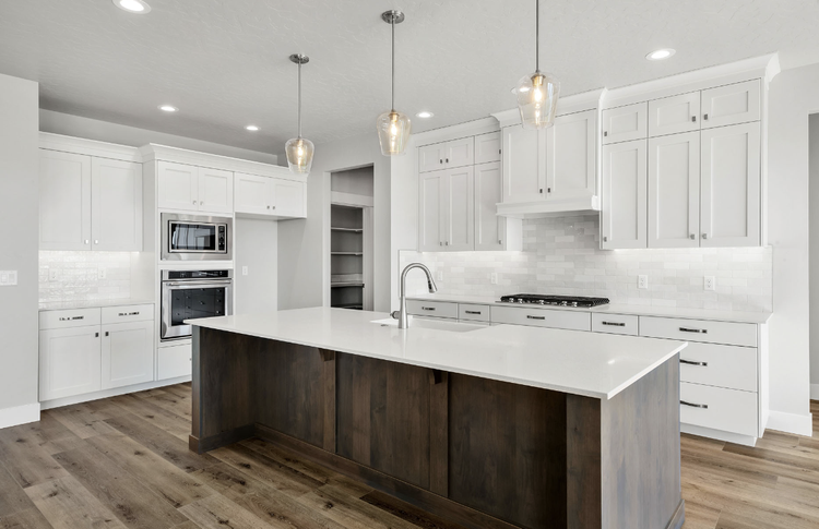 Greyloch Kitchen Island with Pendant Lighting white kitchen island with quartz countertop and pendant lighting