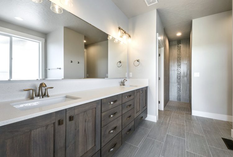 Greyloch Custom Bathroom Vanity Installation dark wood bathroom vanity with undermount sink and tile floor