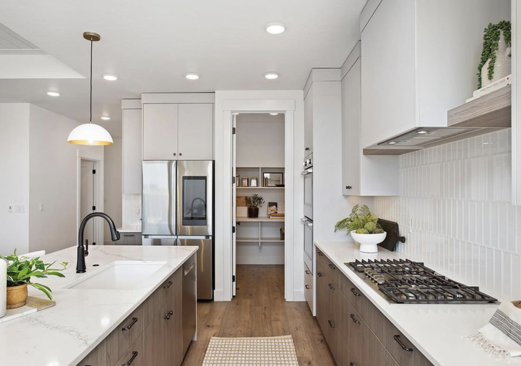 Greyloch White Kitchen with Open Shelving white kitchen with open shelving and stainless appliances