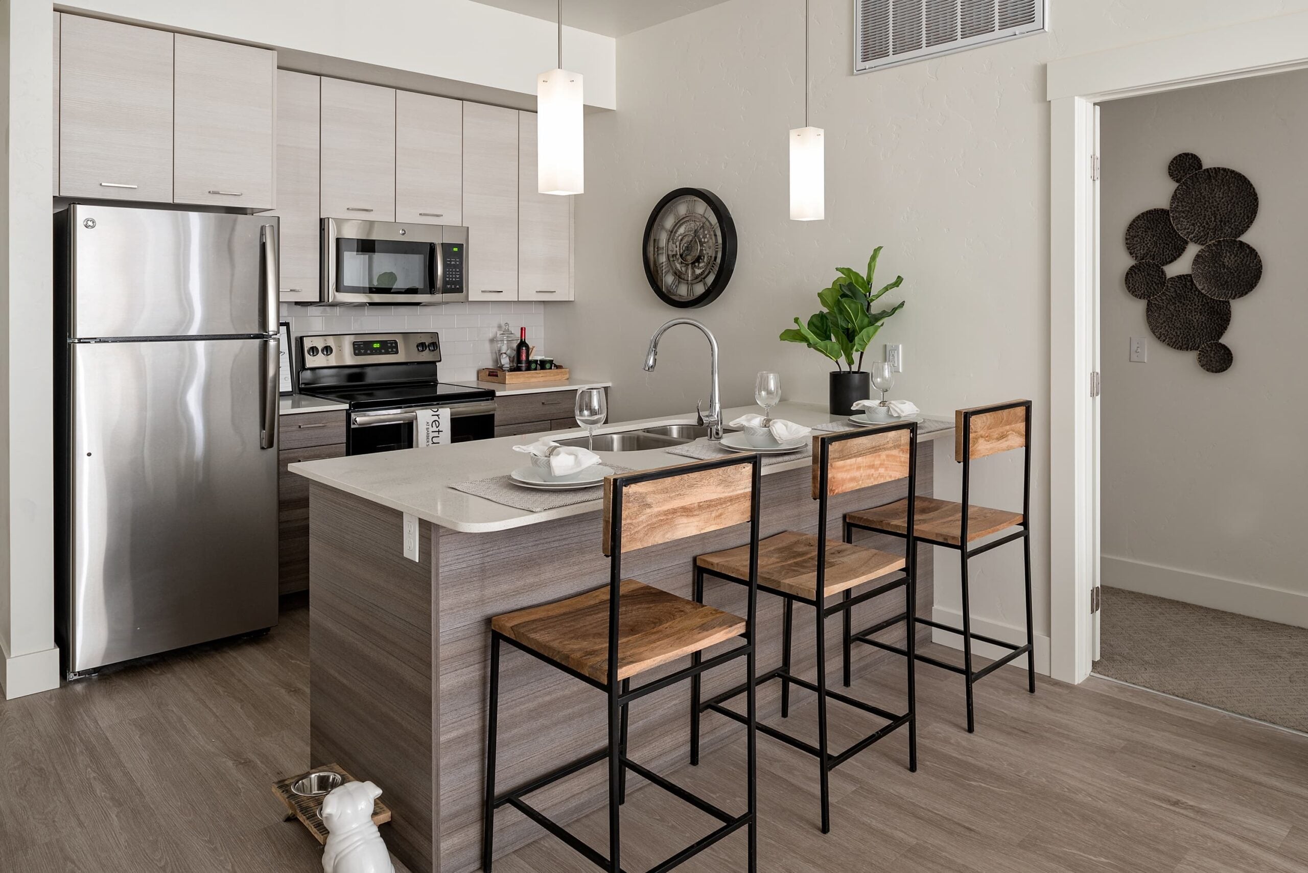 commercial breakroom with wood cabinets and mini fridge