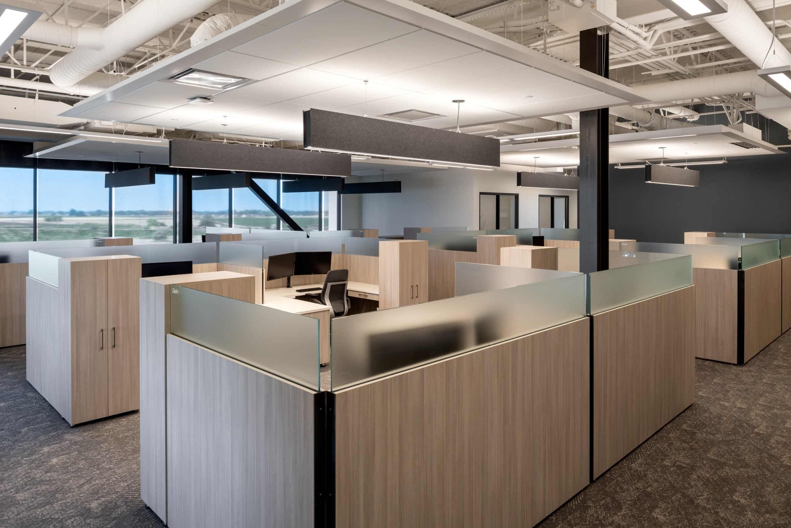 commercial breakroom with wood cabinets and mini fridge